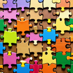 **

Prompt: Puzzle pieces fitting together to form a complete picture, symbolizing collaboration and combining strengths. Include elements representing different skills like writing, crafting, and communication. Bright, harmonious colors.

**